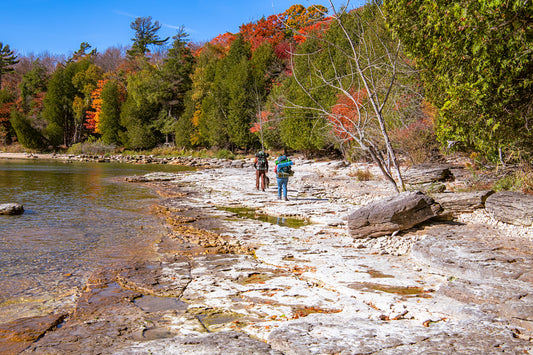 Hikers Pack on Shoreline