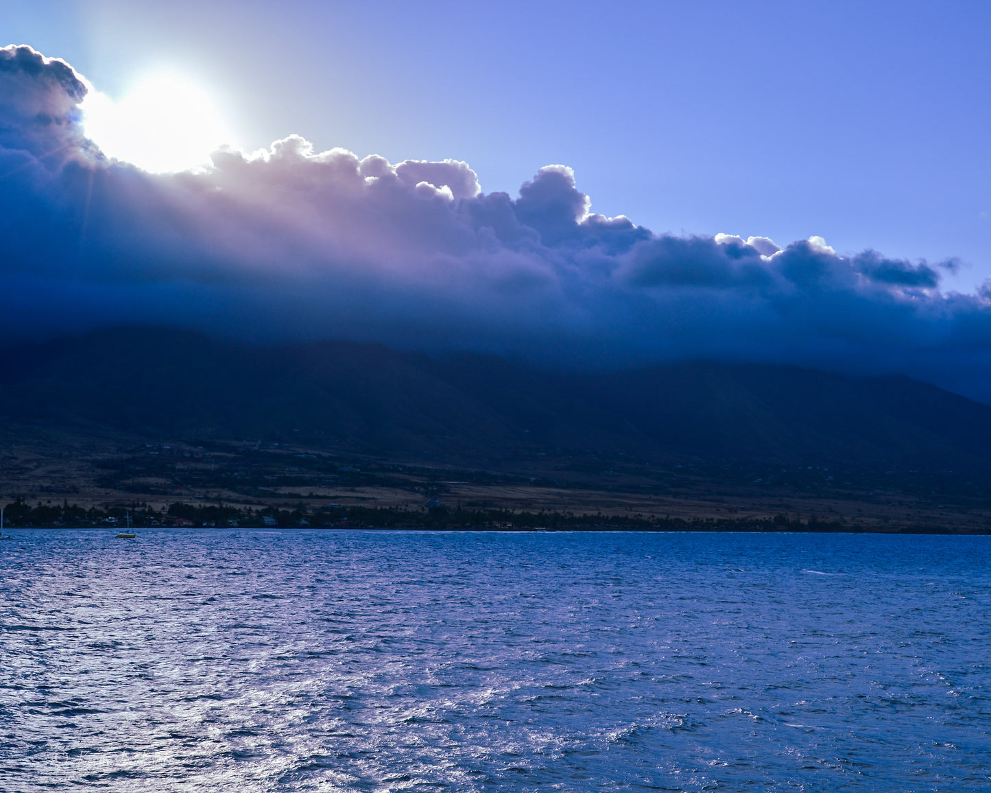 Sun Breaking Though Purple Clouds Select